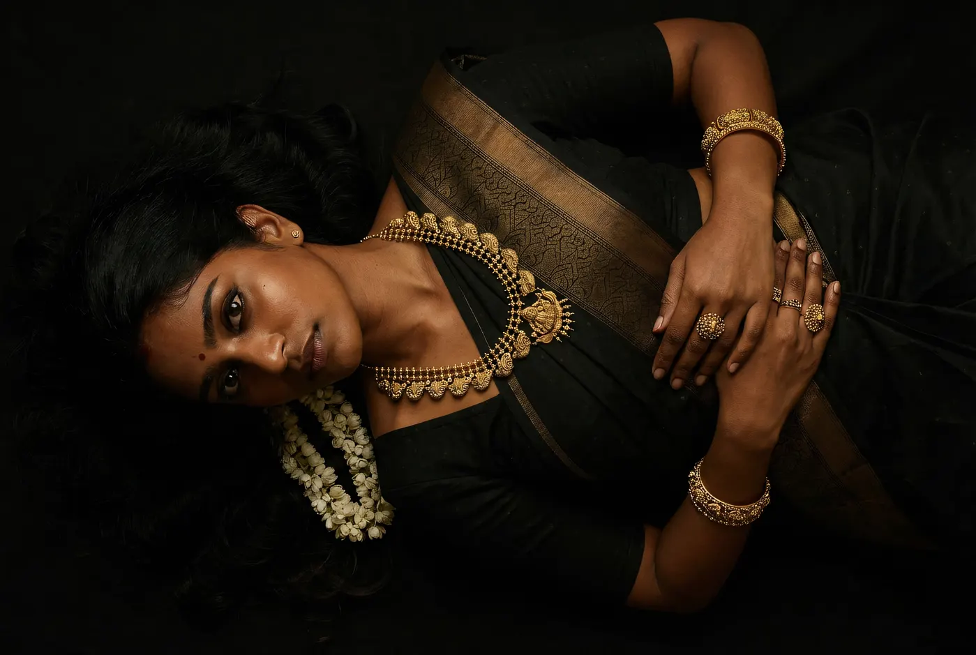 Model wearing bold temple necklace