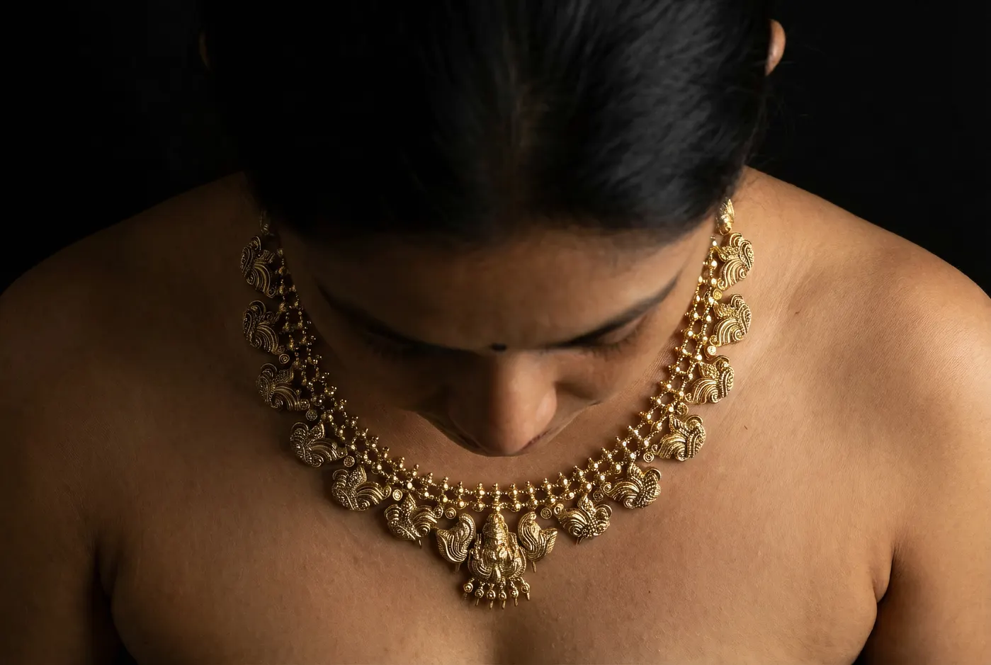 Close-up of Lakshmi Haar on decolletage